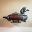 harlequin decoy in decoy wall mount