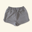 DECOY Ladies Tidal Shorts grey colorway rear view with back pocket on cream background