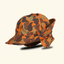 DECOY Blaze Orange Camo Jones Hat with ear flaps on cream background