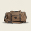 DECOY Waxed Canvas Duffle Bag detail view with waxed canvas construction and leather trim