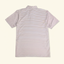 DECOY Beaufort Performance Polo Carrot Island colorway rear view on cream background