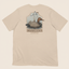 DECOY Canvasback T-Shirt soft cream colorway rear view with Canvasback duck graphic on warm cream background