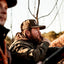 Duck hunter blowing a duck call while wearing DECOY Waxed Canvas 7-Panel Hat